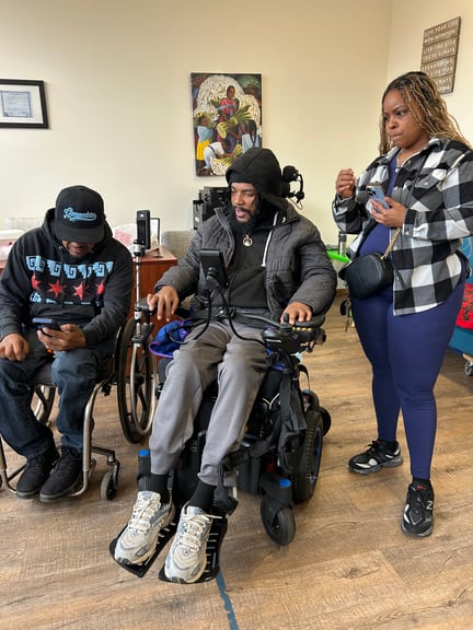 Khiree with his mom, working with Edgar at D4D