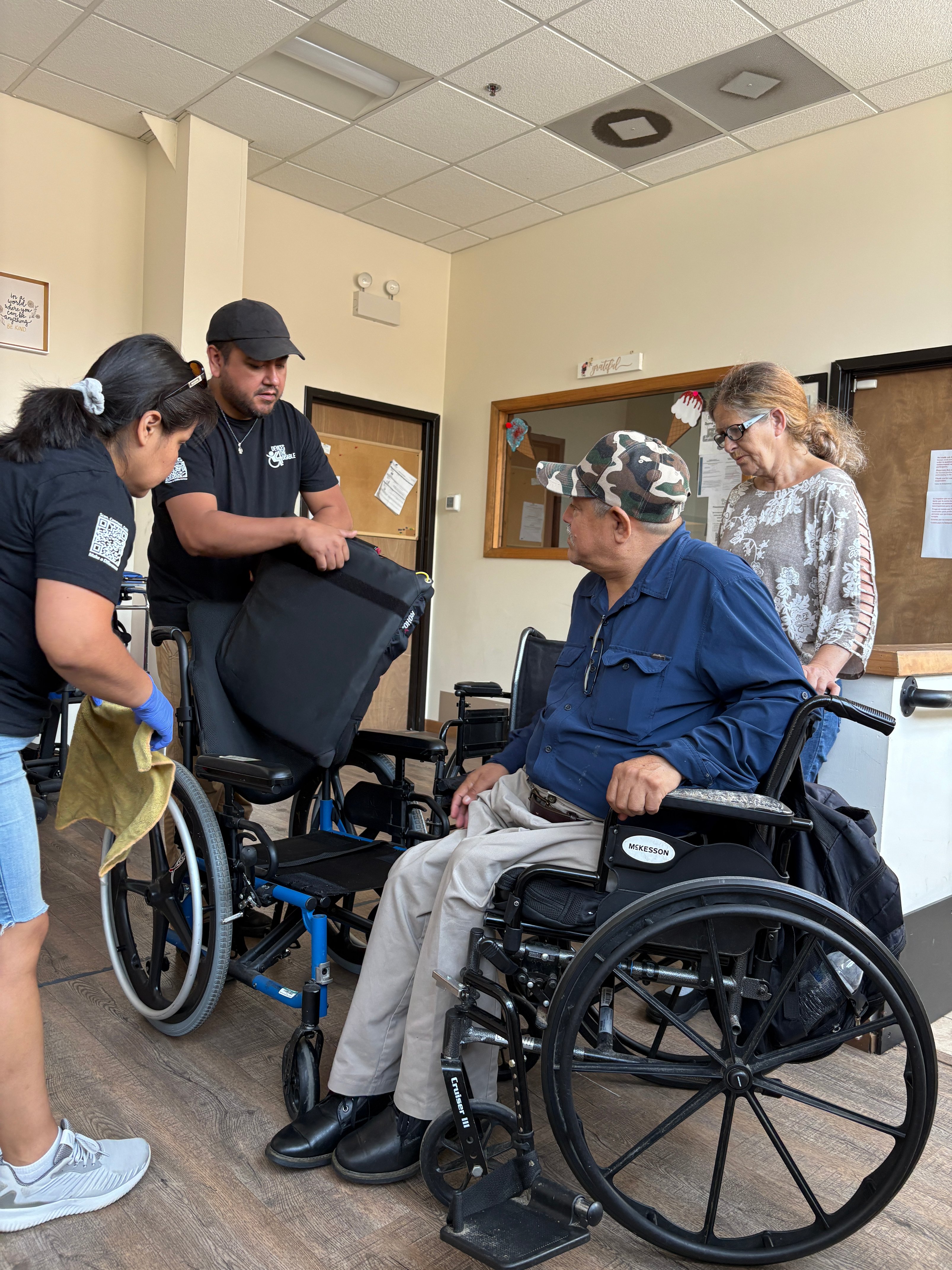 Samuel Looks at His New Chair and Gets Instructions.