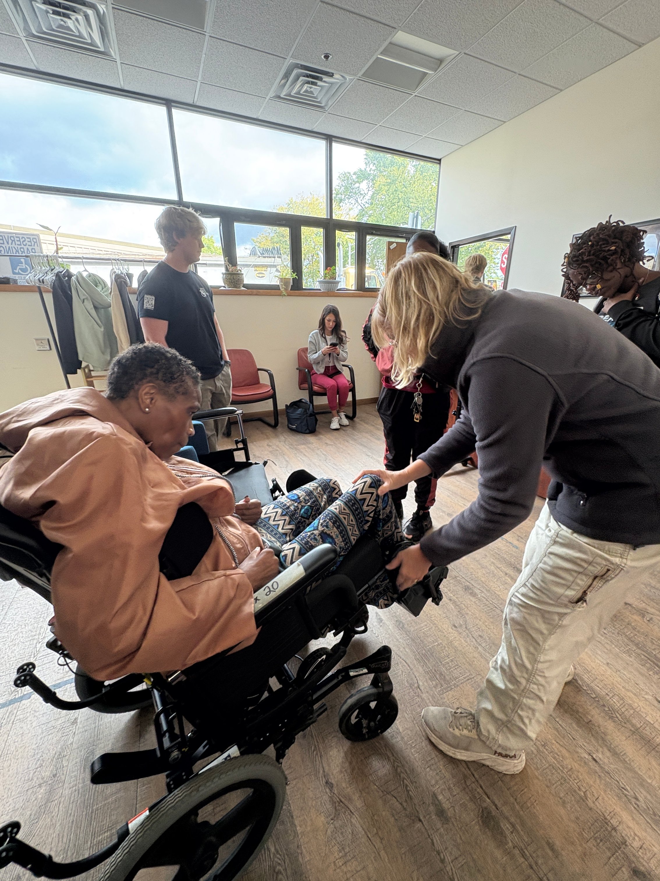 Robbie and D4D staff fit Benella for a wheelchair